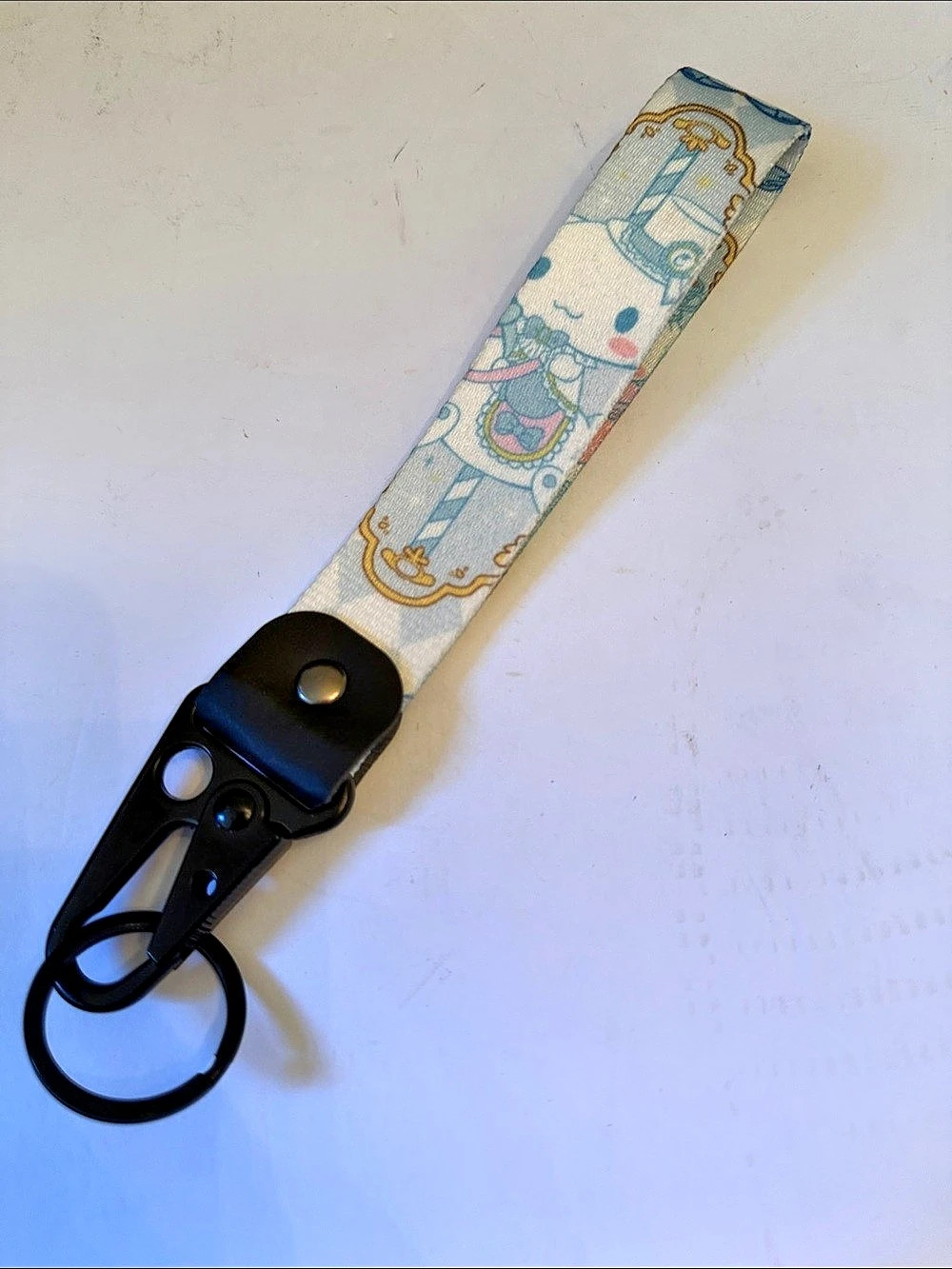 Sanrio Patterned Key Wristlet in Blue & Pink
